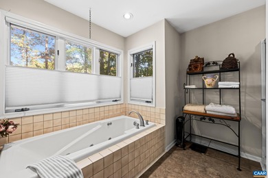 Enjoy peaceful mornings sipping coffee and relaxing evenings on Lake Monticello Golf Course in Virginia - for sale on GolfHomes.com, golf home, golf lot