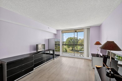 Spectacular golf, lake & tropical garden views from your wrap on Fountains Golf and Country Club in Florida - for sale on GolfHomes.com, golf home, golf lot