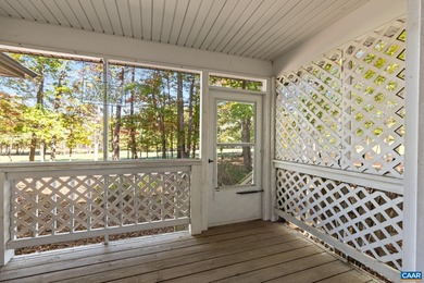 Enjoy peaceful mornings sipping coffee and relaxing evenings on Lake Monticello Golf Course in Virginia - for sale on GolfHomes.com, golf home, golf lot