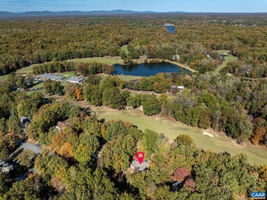 Enjoy peaceful mornings sipping coffee and relaxing evenings on Lake Monticello Golf Course in Virginia - for sale on GolfHomes.com, golf home, golf lot