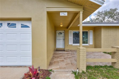 Welcome to this beautifully updated 2 bedroom 2 bath home on Highland Lakes Executive Golf Course in Florida - for sale on GolfHomes.com, golf home, golf lot