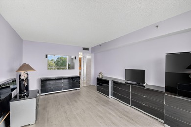 Spectacular golf, lake & tropical garden views from your wrap on Fountains Golf and Country Club in Florida - for sale on GolfHomes.com, golf home, golf lot