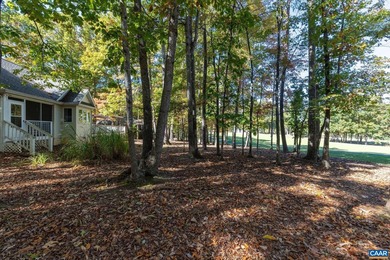 Enjoy peaceful mornings sipping coffee and relaxing evenings on Lake Monticello Golf Course in Virginia - for sale on GolfHomes.com, golf home, golf lot