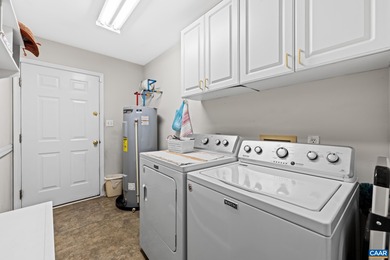 Enjoy peaceful mornings sipping coffee and relaxing evenings on Lake Monticello Golf Course in Virginia - for sale on GolfHomes.com, golf home, golf lot