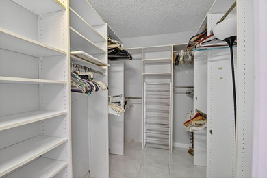 Spectacular golf, lake & tropical garden views from your wrap on Fountains Golf and Country Club in Florida - for sale on GolfHomes.com, golf home, golf lot