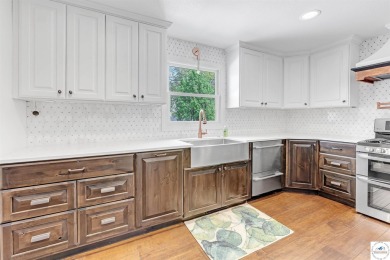 This expansive residence in Sedalia, MO, offers generous living on Sedalia Country Club in Missouri - for sale on GolfHomes.com, golf home, golf lot