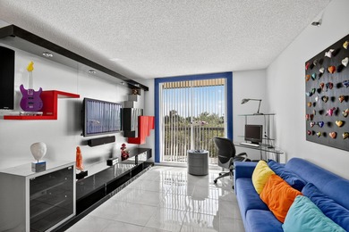 Spectacular golf, lake & tropical garden views from your wrap on Fountains Golf and Country Club in Florida - for sale on GolfHomes.com, golf home, golf lot