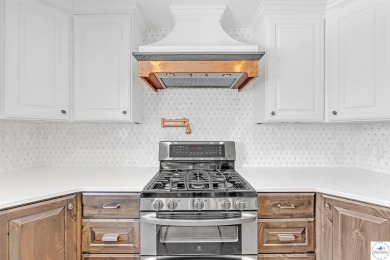 This expansive residence in Sedalia, MO, offers generous living on Sedalia Country Club in Missouri - for sale on GolfHomes.com, golf home, golf lot