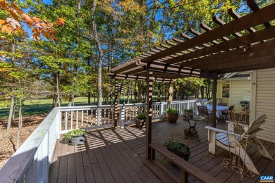 Enjoy peaceful mornings sipping coffee and relaxing evenings on Lake Monticello Golf Course in Virginia - for sale on GolfHomes.com, golf home, golf lot