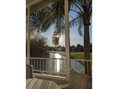 This exclusive listing is on leased land with a monthly lot rent on Hamptons Golf Club in Florida - for sale on GolfHomes.com, golf home, golf lot