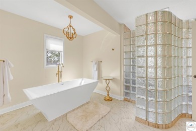 This expansive residence in Sedalia, MO, offers generous living on Sedalia Country Club in Missouri - for sale on GolfHomes.com, golf home, golf lot