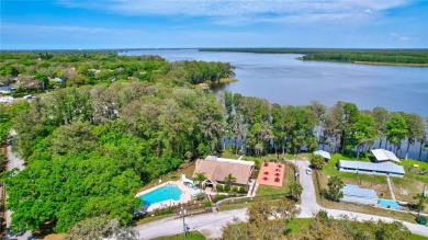Welcome to this beautifully updated 2 bedroom 2 bath home on Highland Lakes Executive Golf Course in Florida - for sale on GolfHomes.com, golf home, golf lot