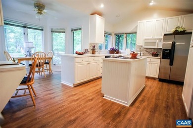 Enjoy peaceful mornings sipping coffee and relaxing evenings on Lake Monticello Golf Course in Virginia - for sale on GolfHomes.com, golf home, golf lot