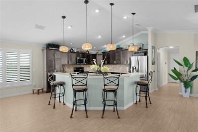 Exquisite WYNDHAM MODEL Oasis in Vibrant MISSION HILLS. Step on The Links of Spruce Creek in Florida - for sale on GolfHomes.com, golf home, golf lot