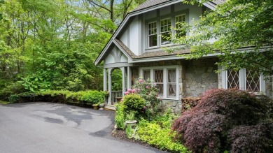 This charming bungalow is nestled in the woods within the quiet on Trillium Links in North Carolina - for sale on GolfHomes.com, golf home, golf lot