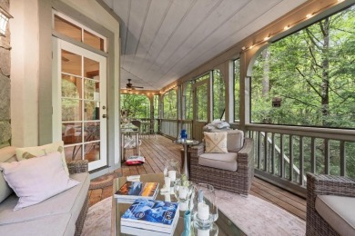 This charming bungalow is nestled in the woods within the quiet on Trillium Links in North Carolina - for sale on GolfHomes.com, golf home, golf lot