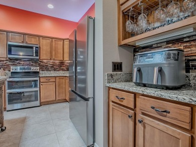 Surrounded by lush, mature landscaping, this beautiful Aspen- on The Links of Spruce Creek in Florida - for sale on GolfHomes.com, golf home, golf lot
