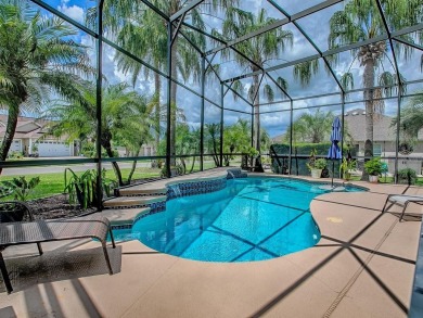 Surrounded by lush, mature landscaping, this beautiful Aspen- on The Links of Spruce Creek in Florida - for sale on GolfHomes.com, golf home, golf lot
