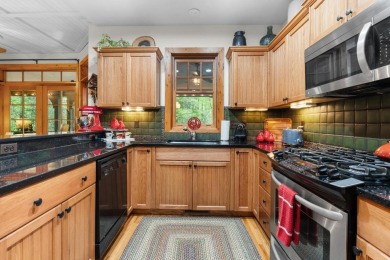 This charming bungalow is nestled in the woods within the quiet on Trillium Links in North Carolina - for sale on GolfHomes.com, golf home, golf lot