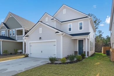 Located in the Jasmine Point lakes community of Cane Bay on Cypress Point Par 3 in South Carolina - for sale on GolfHomes.com, golf home, golf lot