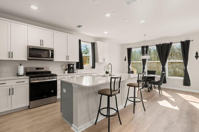 Located in the Jasmine Point lakes community of Cane Bay on Cypress Point Par 3 in South Carolina - for sale on GolfHomes.com, golf home, golf lot