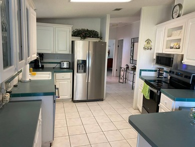 Welcome to The Heritage - Your Slice of Paradise in North Fort on Sabal Springs Golf and Racquet Club in Florida - for sale on GolfHomes.com, golf home, golf lot