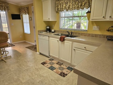 This 2005 Skyline with 2-bedrooms, 2 baths and 1,176 square feet on Big Cypress Golf and Country Club in Florida - for sale on GolfHomes.com, golf home, golf lot
