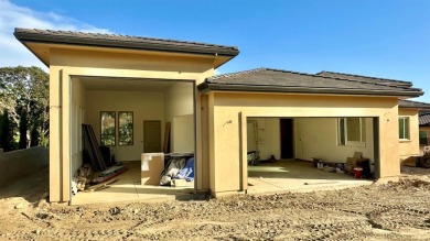 New custom home on golf course lot. This spectacular on The Club at Copper Valley Golf Course in California - for sale on GolfHomes.com, golf home, golf lot