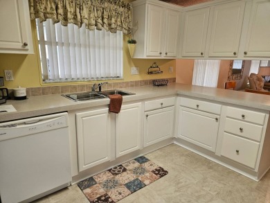 This 2005 Skyline with 2-bedrooms, 2 baths and 1,176 square feet on Big Cypress Golf and Country Club in Florida - for sale on GolfHomes.com, golf home, golf lot