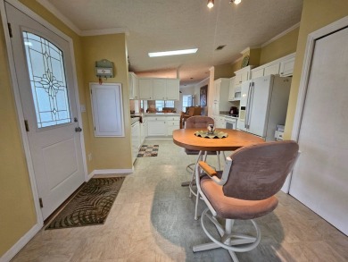 This 2005 Skyline with 2-bedrooms, 2 baths and 1,176 square feet on Big Cypress Golf and Country Club in Florida - for sale on GolfHomes.com, golf home, golf lot