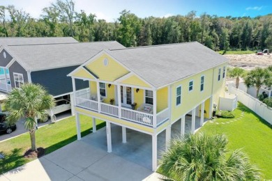 STUNNING HOME features three bedrooms and three full bathrooms on Tidewater Golf Club and Plantation in South Carolina - for sale on GolfHomes.com, golf home, golf lot