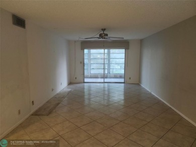 WYNMOOR--HOPA---MUST BE 55+ TO LIVE HERE-- LOCATED IN  A 24 HOUR on Wynmoor Golf Course in Florida - for sale on GolfHomes.com, golf home, golf lot