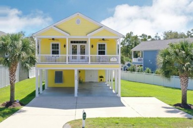 STUNNING HOME features three bedrooms and three full bathrooms on Tidewater Golf Club and Plantation in South Carolina - for sale on GolfHomes.com, golf home, golf lot