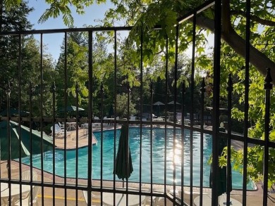 Located in the private gated community of Forest Meadows, half on Forest Meadows Golf Course in California - for sale on GolfHomes.com, golf home, golf lot