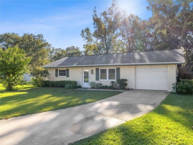 Under contract-accepting backup offers. This home sits on a on Sherman Hills Golf Club in Florida - for sale on GolfHomes.com, golf home, golf lot