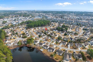 Discover peaceful coastal living in this Surfside Beach home on Wicked Stick Golf Club in South Carolina - for sale on GolfHomes.com, golf home, golf lot