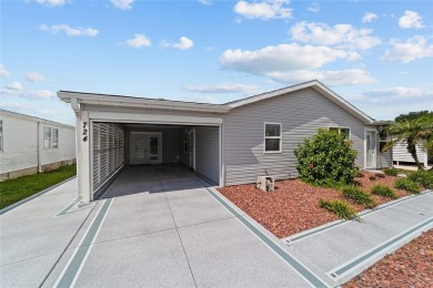 NO BOND and no CDD maintenance tax!   This 2-bedroom, 2-bath on El Diablo Executive Golf Course in Florida - for sale on GolfHomes.com, golf home, golf lot