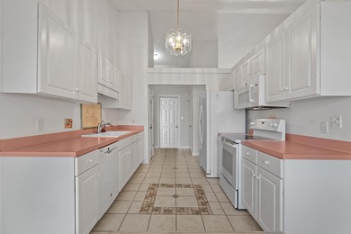 Discover peaceful coastal living in this Surfside Beach home on Wicked Stick Golf Club in South Carolina - for sale on GolfHomes.com, golf home, golf lot