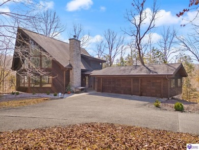 This is a custom Lindal Cedar Home that is designed to blend on Doe Valley Country Club in Kentucky - for sale on GolfHomes.com, golf home, golf lot