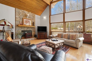 This is a custom Lindal Cedar Home that is designed to blend on Doe Valley Country Club in Kentucky - for sale on GolfHomes.com, golf home, golf lot