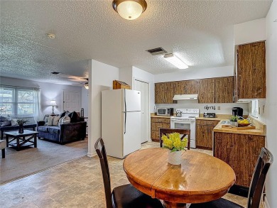 Under contract-accepting backup offers. This home sits on a on Sherman Hills Golf Club in Florida - for sale on GolfHomes.com, golf home, golf lot