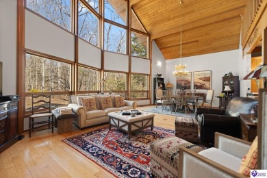 This is a custom Lindal Cedar Home that is designed to blend on Doe Valley Country Club in Kentucky - for sale on GolfHomes.com, golf home, golf lot