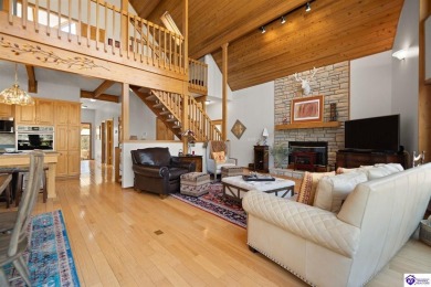 This is a custom Lindal Cedar Home that is designed to blend on Doe Valley Country Club in Kentucky - for sale on GolfHomes.com, golf home, golf lot