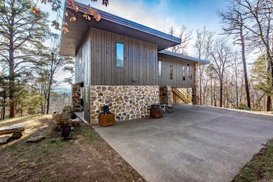 Stunning Mid-Century Mountain Retreat! Nestled among the trees on Mountain Ranch Golf Club in Arkansas - for sale on GolfHomes.com, golf home, golf lot