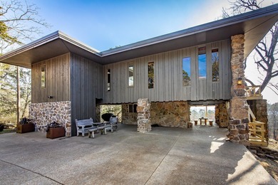 Stunning Mid-Century Mountain Retreat! Nestled among the trees on Mountain Ranch Golf Club in Arkansas - for sale on GolfHomes.com, golf home, golf lot