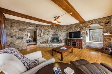 Stunning Mid-Century Mountain Retreat! Nestled among the trees on Mountain Ranch Golf Club in Arkansas - for sale on GolfHomes.com, golf home, golf lot