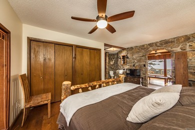 Stunning Mid-Century Mountain Retreat! Nestled among the trees on Mountain Ranch Golf Club in Arkansas - for sale on GolfHomes.com, golf home, golf lot