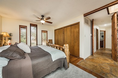 Stunning Mid-Century Mountain Retreat! Nestled among the trees on Mountain Ranch Golf Club in Arkansas - for sale on GolfHomes.com, golf home, golf lot