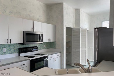 Located in a designated 55+ community, this three-bedroom home on Sabal Springs Golf and Racquet Club in Florida - for sale on GolfHomes.com, golf home, golf lot