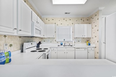 Welcome to this stunning 2-bedroom, 2-bathroom golf villa in the on Barefoot Resort and Golf Club  in South Carolina - for sale on GolfHomes.com, golf home, golf lot